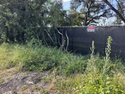 Altadena construction site with privacy fence featuring our drainage design for corner lot