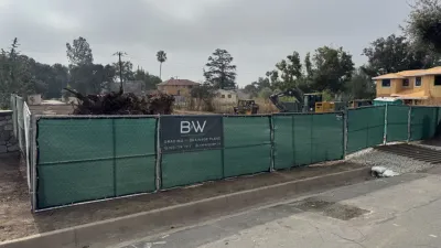 Construction site photo of the Altadena multi-unit fire rebuild on Ganesha Avenue during grading and drainage work