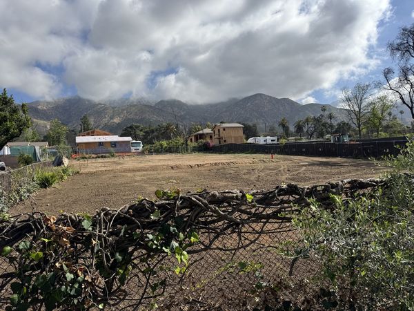Cleared Altadena lot showing natural grade and topography before pool removal and rough grading