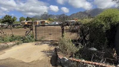 Altadena lot after pool removal and rough grading with natural slope ready for new construction