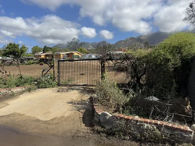 Altadena lot after pool removal and rough grading with natural slope ready for new construction