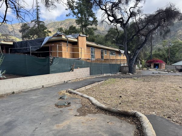 Single-story Altadena home under construction following Eaton Fire with proper sheet flow grading design