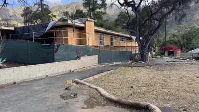 Altadena single story construction with Eaton Fire sheet flow drainage design
