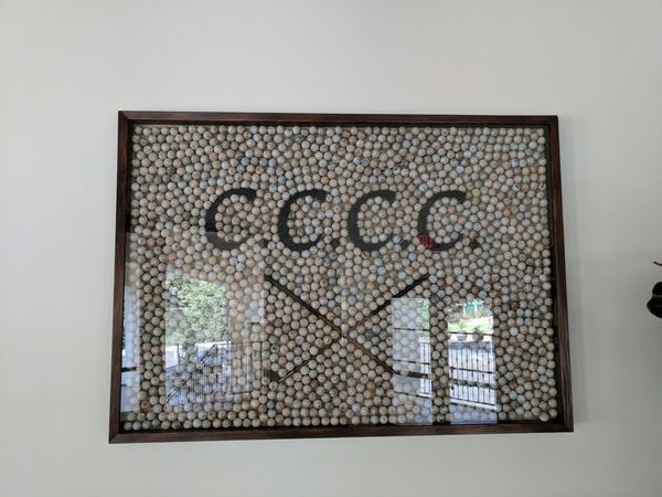 Chevy Chase Country Club golf ball display honoring the club's heritage following our grading plan completion