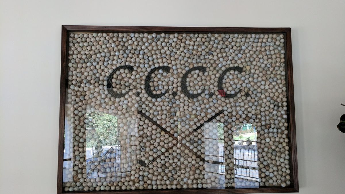 Chevy Chase Country Club golf ball display honoring the club's heritage following our grading plan completion
