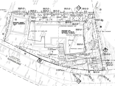 Grading plan for a Pacific Palisades hillside lot showing proposed grades, area drains, and drainage routing on a 12% slope street