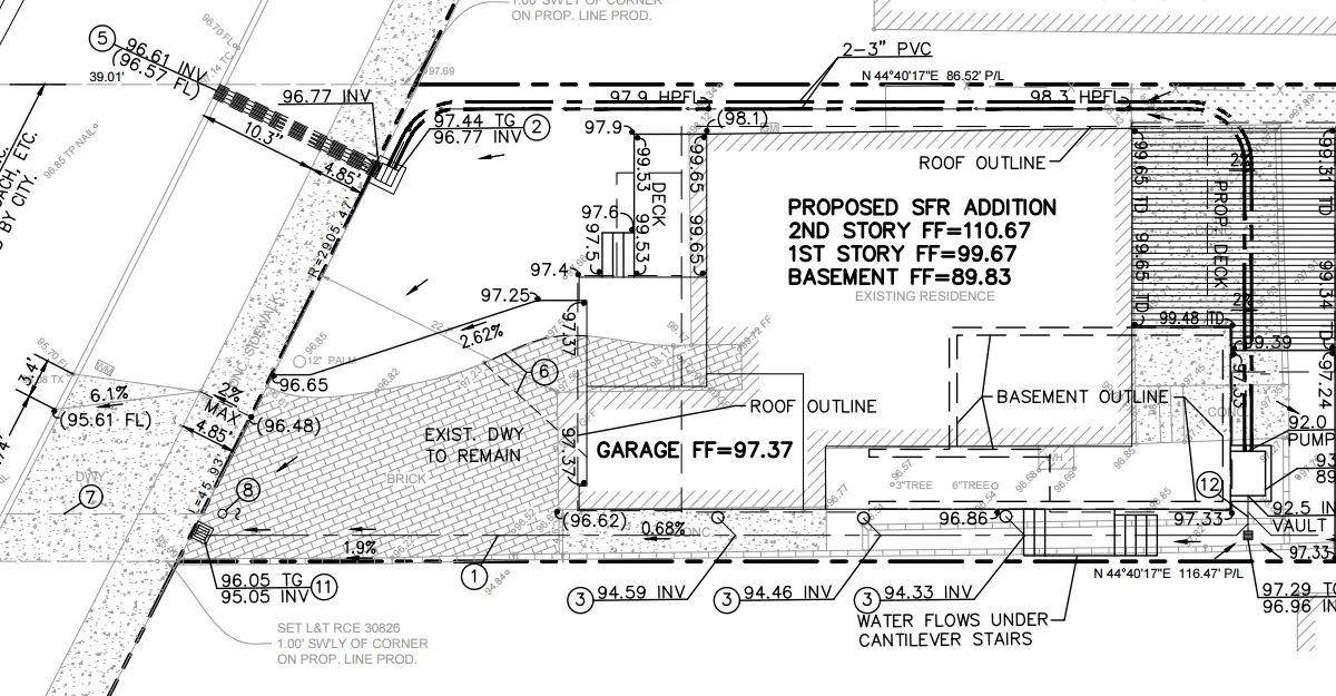 Grading plan for Redondo Beach residence showing proposed addition, drainage system, area drains, and sump pump location